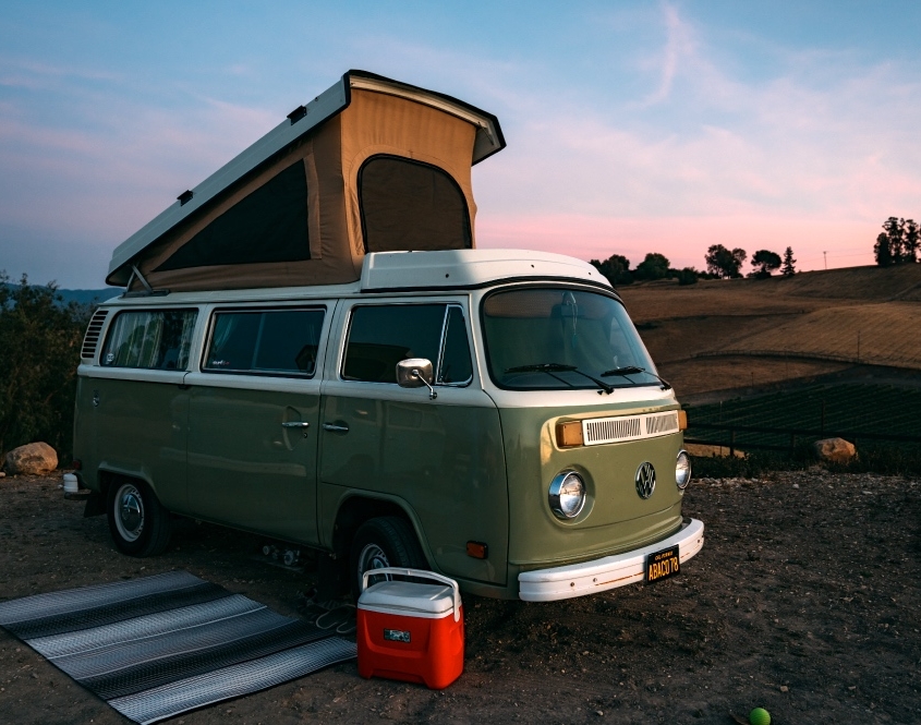 Green VW Bus Glamping Setup